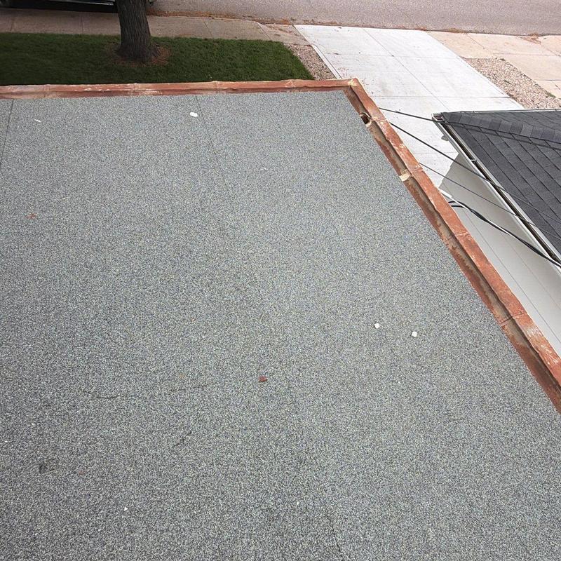 Flat roof surface and copper edging inspection Flat roof surface and copper edging inspection