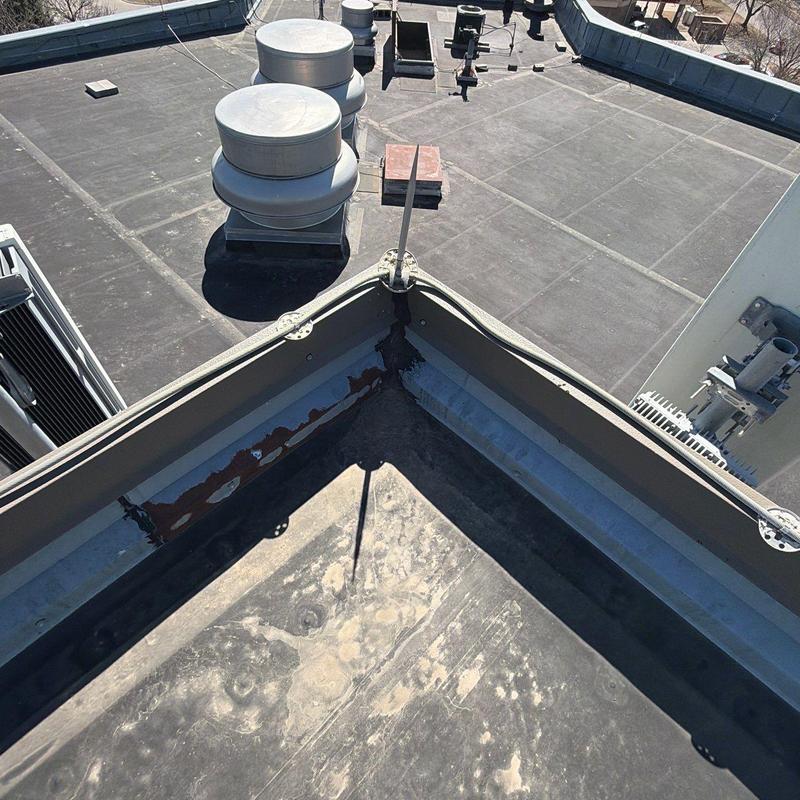 Flat roof membrane with ventilation fans and flashing details Flat roof membrane with ventilation fans and flashing details