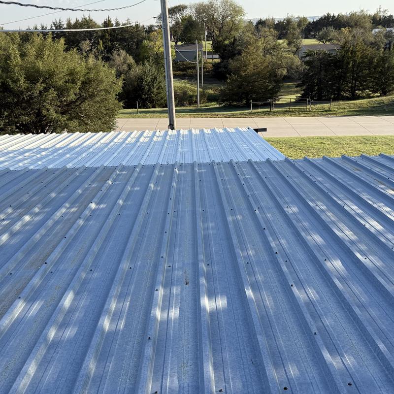 Metal roof panels on commercial building with no damage Metal roof panels on commercial building with no damage