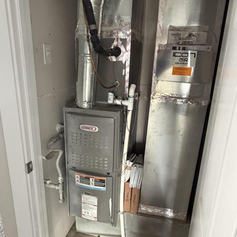 Lennox furnace with new air filters in closet