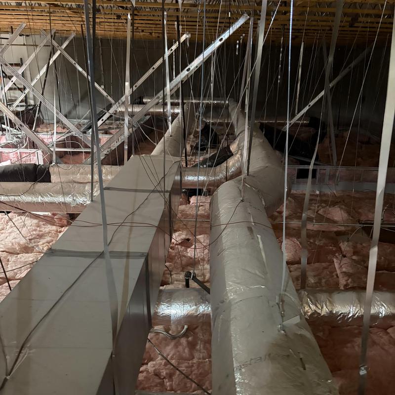 HVAC ductwork and insulation in attic space HVAC ductwork and insulation in attic space