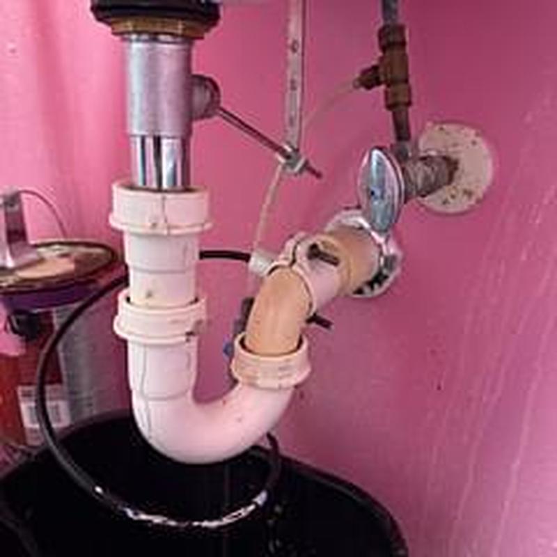 Pop-up assembly and angle stop under bathroom sink Pop-up assembly and angle stop under bathroom sink
