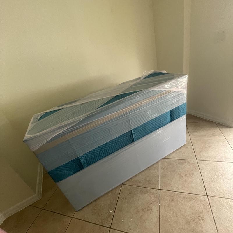 Wrapped mattress and box spring secured for moving