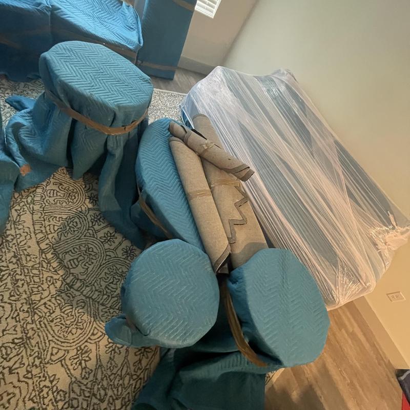Furniture wrapped and padded for moving in home