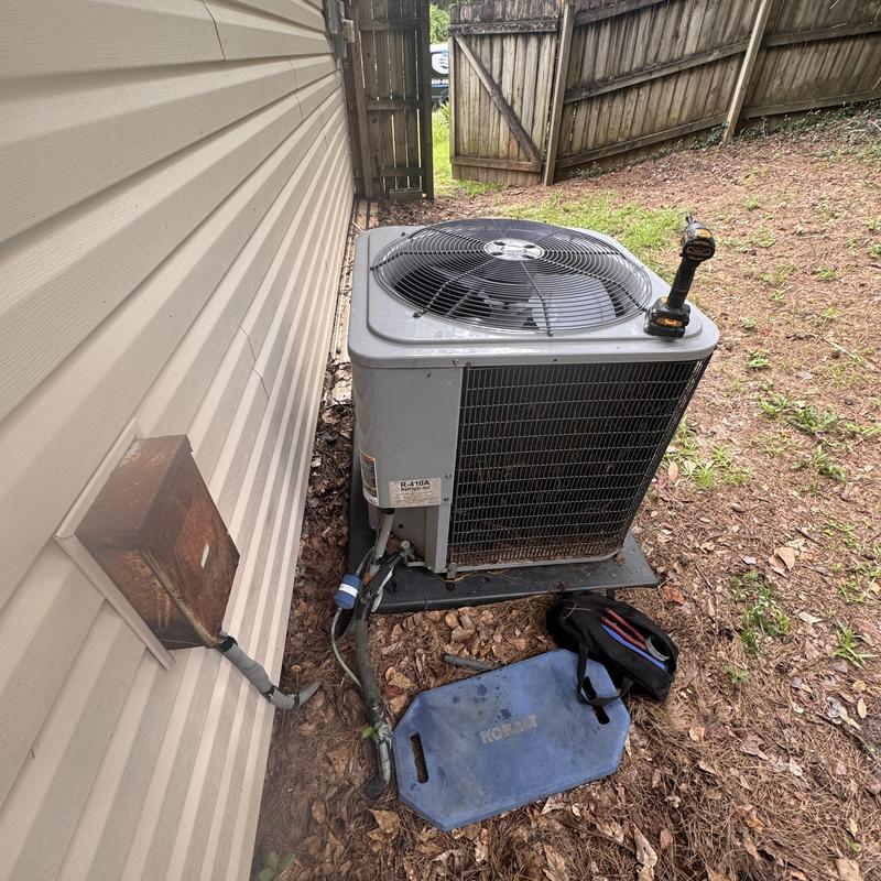 Condenser fan motor on heat pump system with tools
