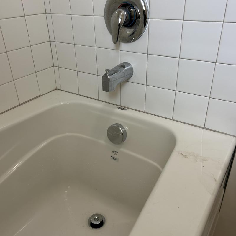 Bathtub faucet and drain with tiled wall Bathtub faucet and drain with tiled wall