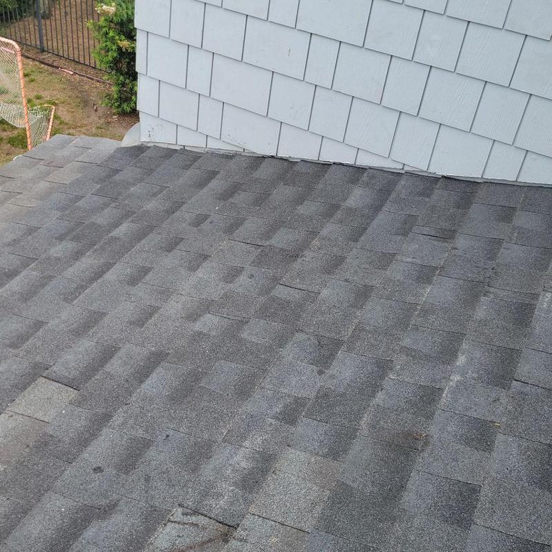 Asphalt shingle roof with replaced decking section Asphalt shingle roof with replaced decking section
