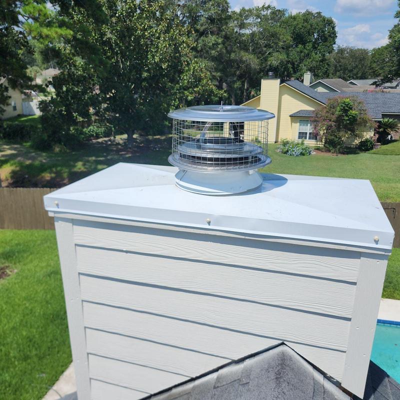 Chimney chase cover with new flue cap installation Chimney chase cover with new flue cap installation