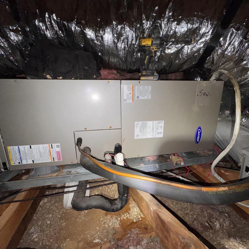Heat pump split system air handler in attic