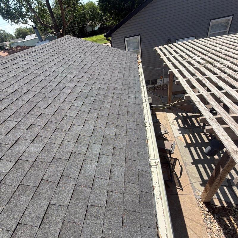 Asphalt shingle roof with gutter system in Hastings Asphalt shingle roof with gutter system in Hastings
