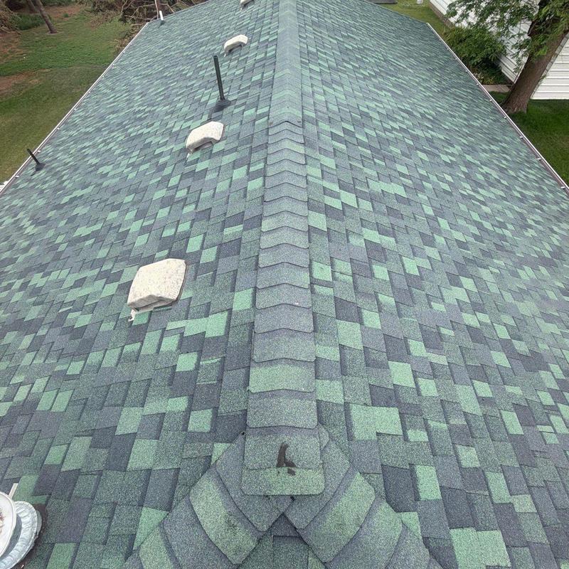 Asphalt shingle roof with vents and ridge cap in Inland, NE Asphalt shingle roof with vents and ridge cap in Inland, NE