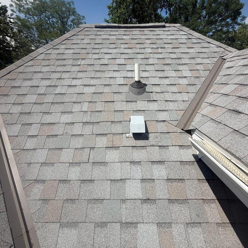 Roof vent flashing and asphalt shingle roof section Roof vent flashing and asphalt shingle roof section