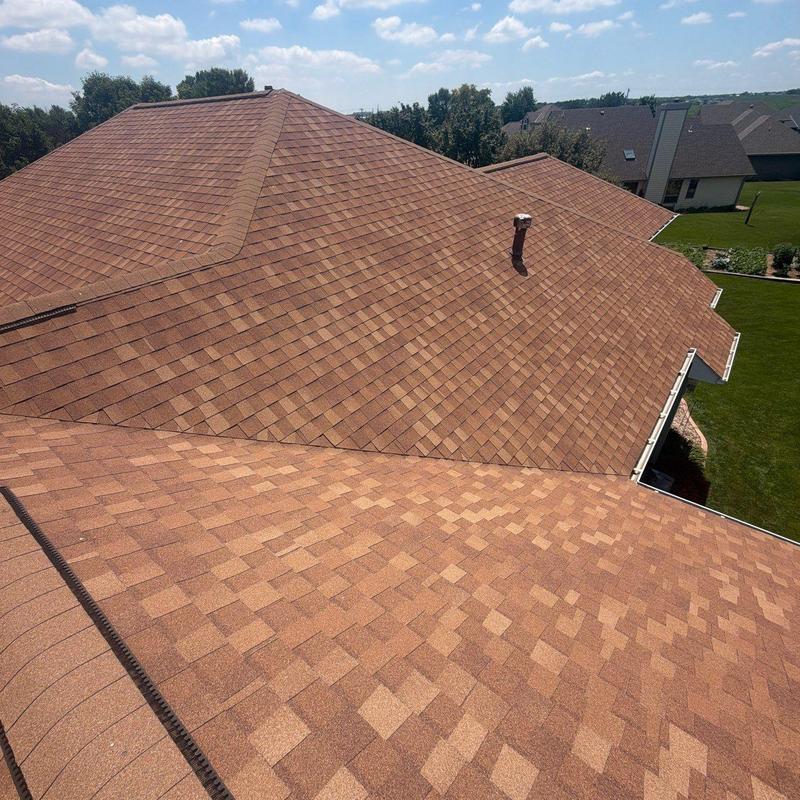 Asphalt shingle roof inspection on residential house Asphalt shingle roof inspection on residential house