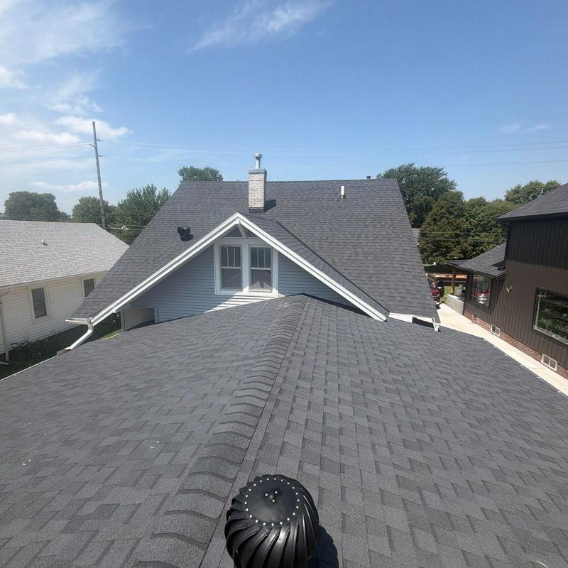 Asphalt shingle roof with turbine vent in Hastings, NE Asphalt shingle roof with turbine vent in Hastings, NE