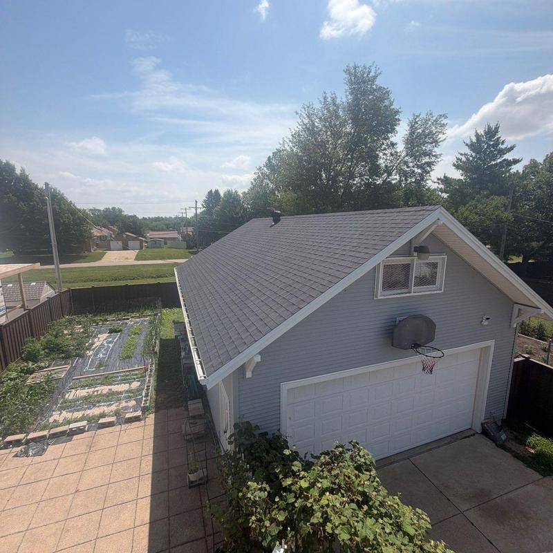 Asphalt shingle roof inspection on detached garage Asphalt shingle roof inspection on detached garage