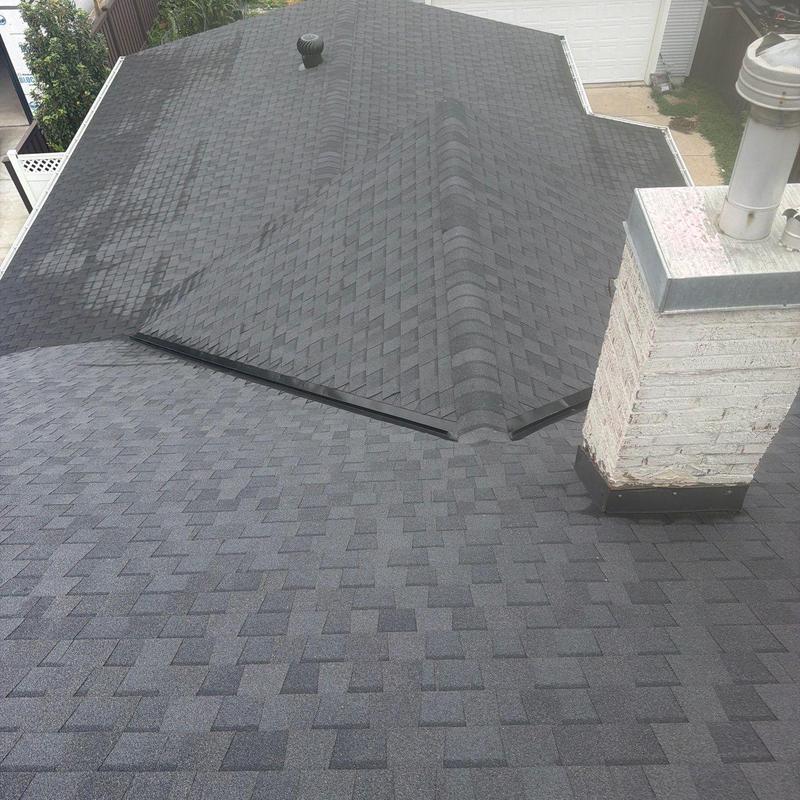 Asphalt shingle roof with chimney and vent pipe Asphalt shingle roof with chimney and vent pipe
