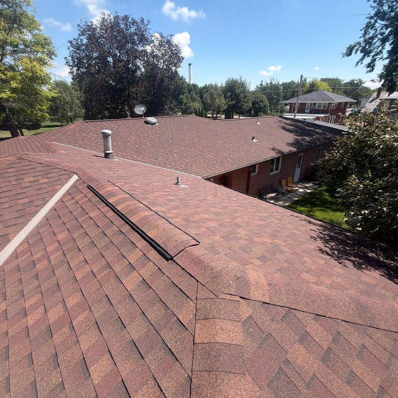 Asphalt shingle roof with ridge vents in Hastings, NE Asphalt shingle roof with ridge vents in Hastings, NE