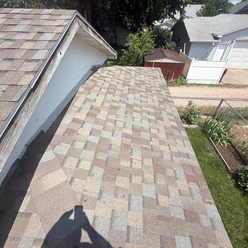 Asphalt shingle roof section with vent pipe and gutter Asphalt shingle roof section with vent pipe and gutter