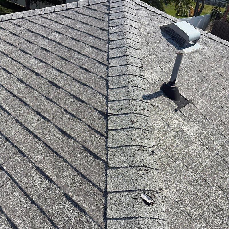 Asphalt shingle ridge with vent pipe and roof vent Asphalt shingle ridge with vent pipe and roof vent