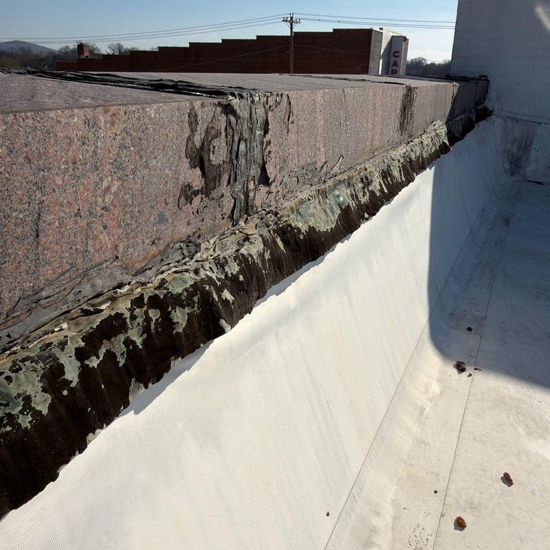 Roof flashing with deteriorated sealant and cracks