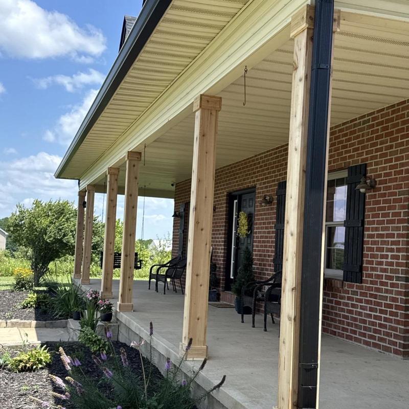 Cedar wood porch pillar wrapping on brick house exterior Cedar wood porch pillar wrapping on brick house exterior