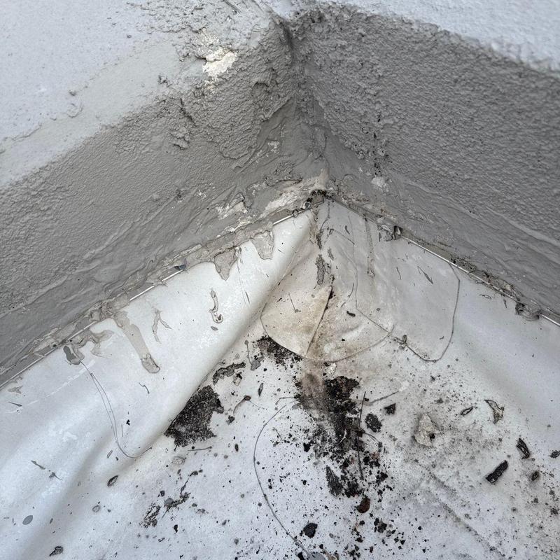 TPO roofing membrane damage and corner seal deterioration