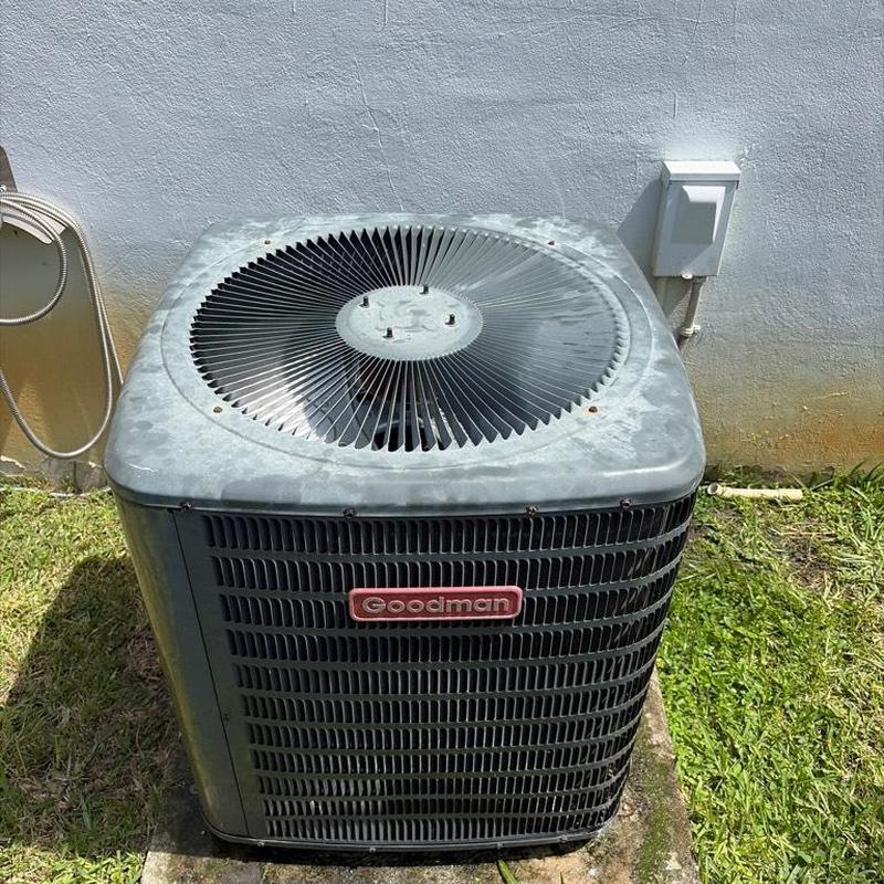 Goodman outdoor AC unit on concrete pad Goodman outdoor AC unit on concrete pad
