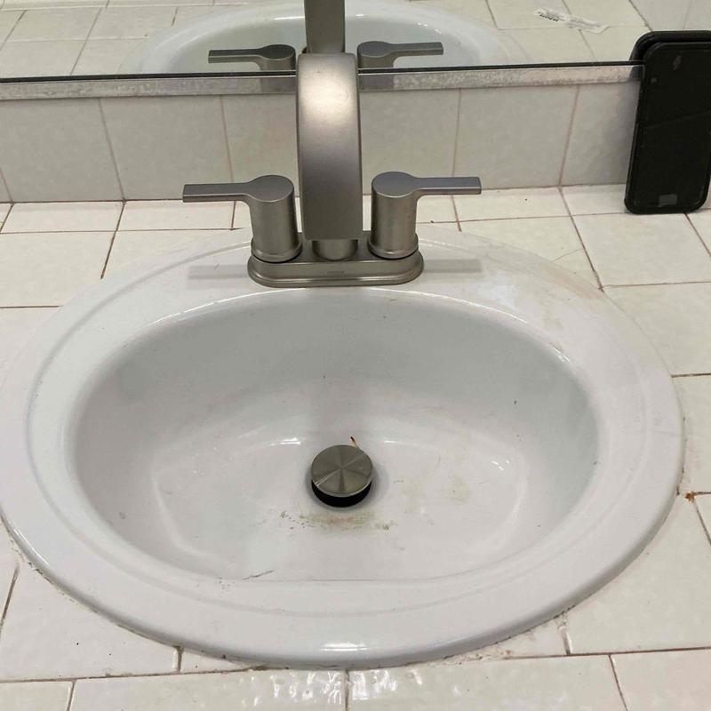 Center set faucet and sink in guest bathroom Center set faucet and sink in guest bathroom