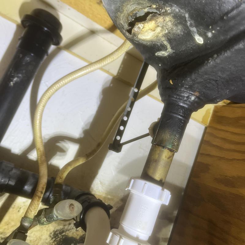 Sink basin drain pipe with corrosion and tubing connections Sink basin drain pipe with corrosion and tubing connections