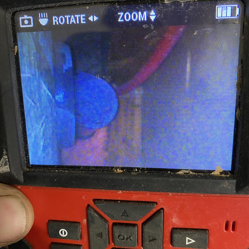 Tub spout leak inspection on camera monitor