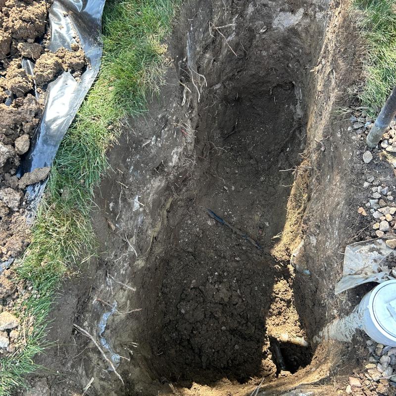 Yard pipe excavation for leak repair under backflow device Yard pipe excavation for leak repair under backflow device