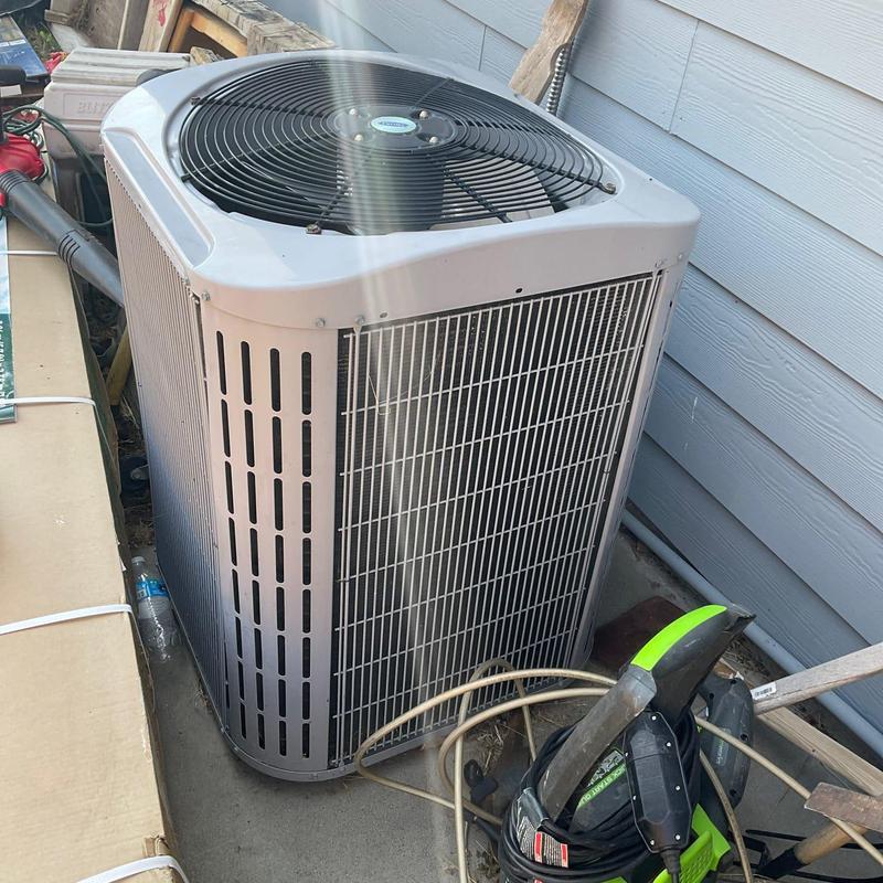 Outdoor air conditioning condenser unit with fan