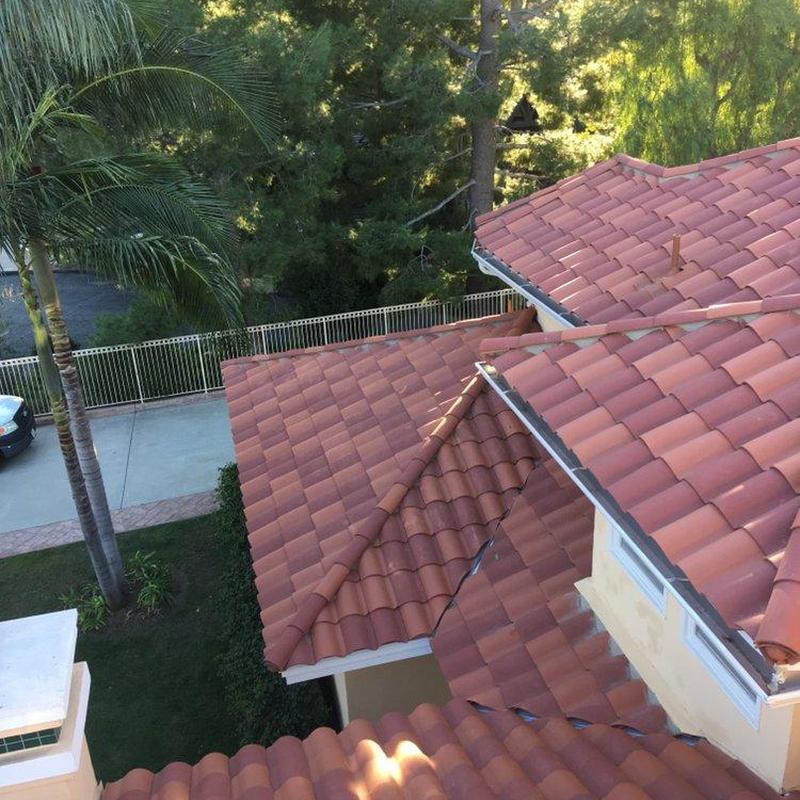 Tile roofing system installation on residential home Tile roofing system installation on residential home