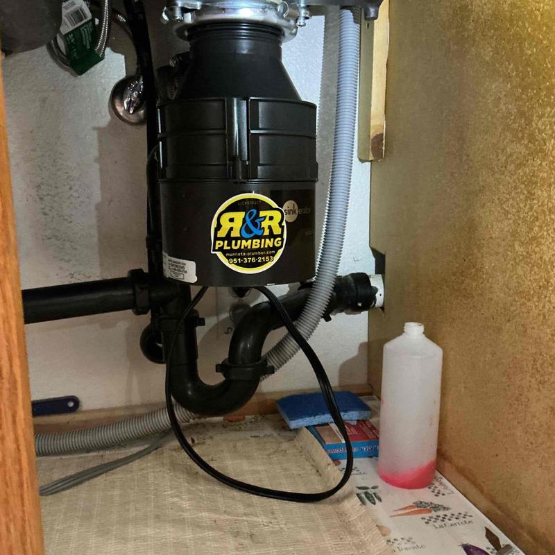 In-Sink-Erator garbage disposal with plumbing connections In-Sink-Erator garbage disposal with plumbing connections