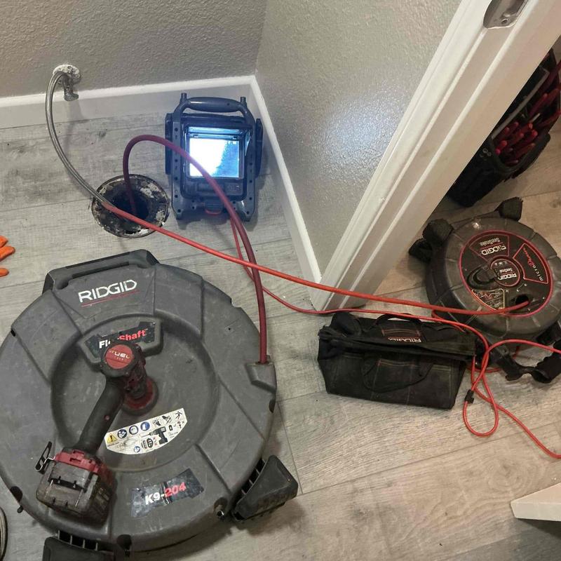 Sewer stack descaling tools and inspection camera setup