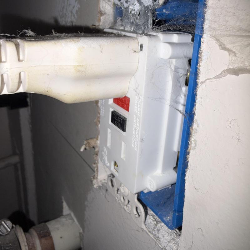 GFCI electrical outlet reset for macerating toilet power GFCI electrical outlet reset for macerating toilet power