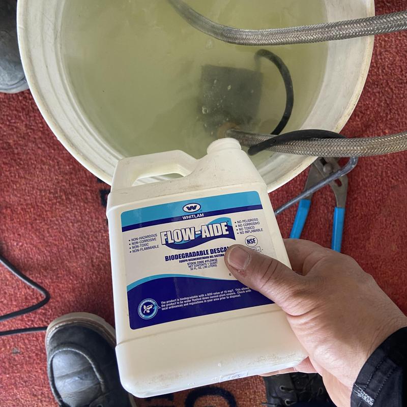 Water softener cleaning with Flow-Aide solution Water softener cleaning with Flow-Aide solution
