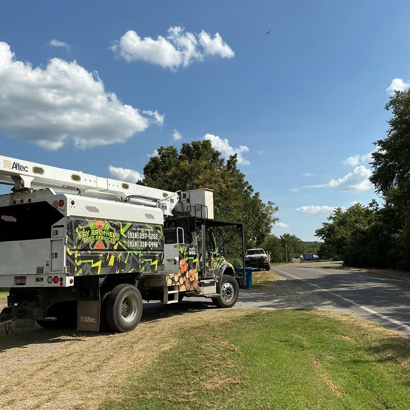 Bucket truck parked for tree trimming service in Oklahoma