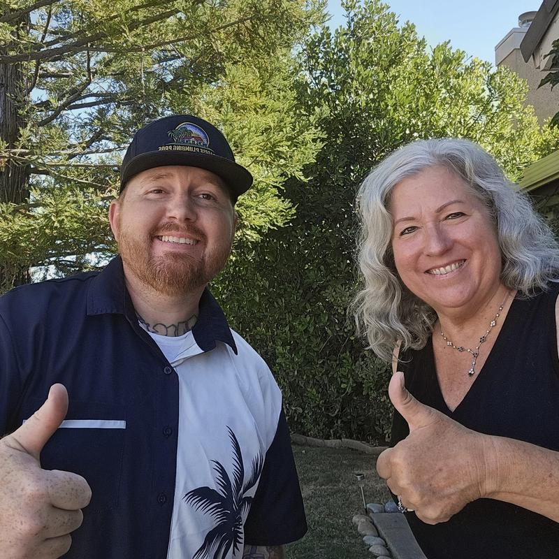 Kitchen sink and faucet replacement thumbs up outdoors