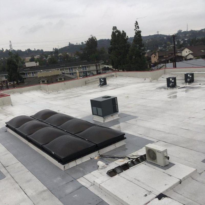 Commercial flat roof skylights and HVAC units inspection Commercial flat roof skylights and HVAC units inspection