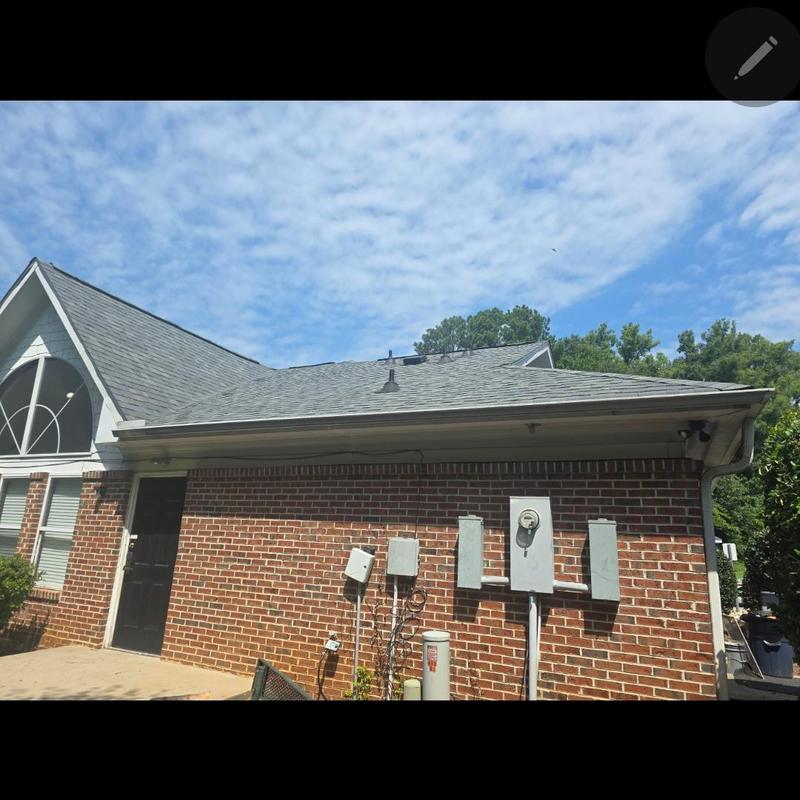 Bathroom vent replacement on brick leasing office wall