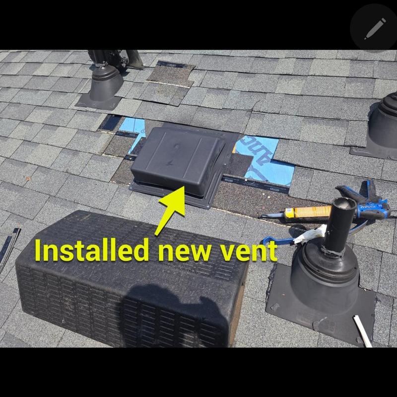 Bathroom roof vent installation on shingled roof