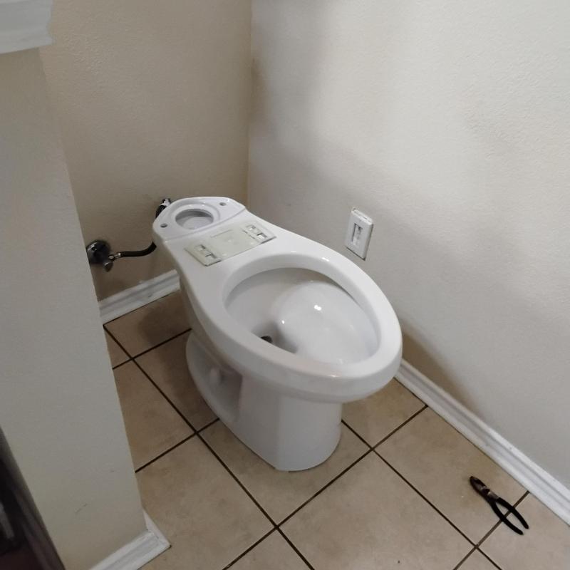 Toilet bowl installation without tank on tiled floor