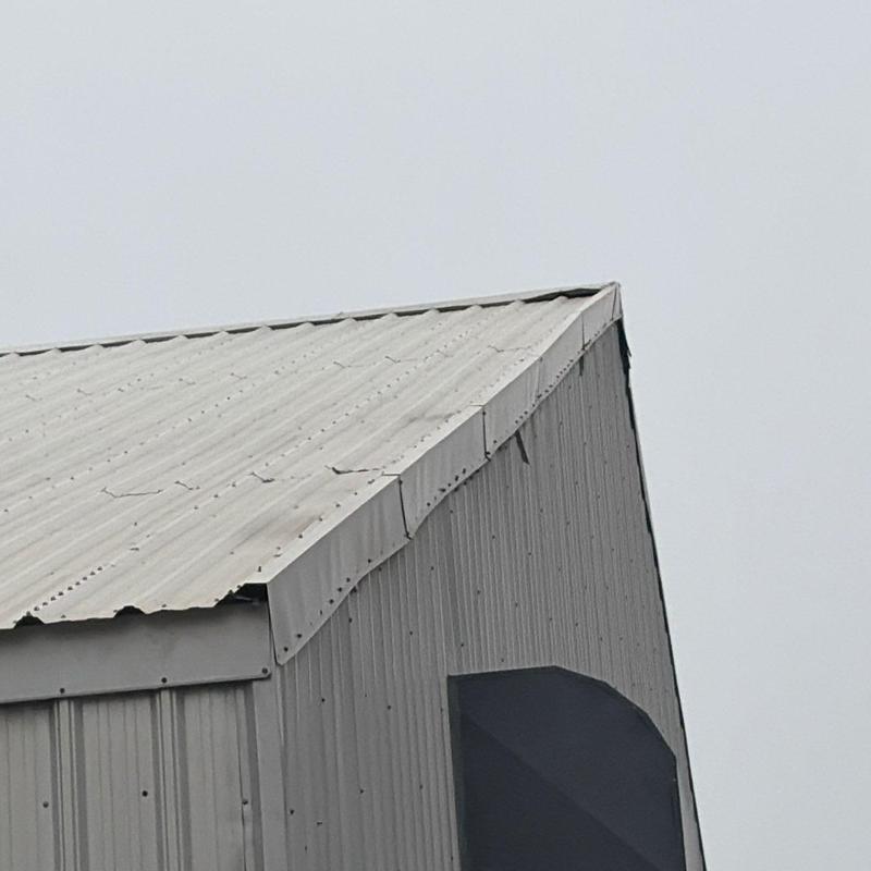 Metal roof panel inspection on barn in Funk, NE Metal roof panel inspection on barn in Funk, NE