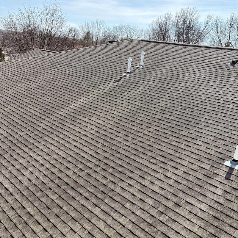 Asphalt shingle roof with vent pipes in Lincoln, NE Asphalt shingle roof with vent pipes in Lincoln, NE