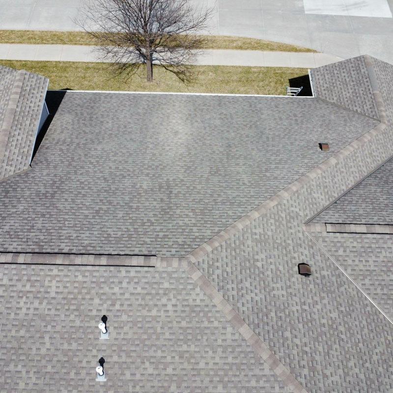 Asphalt shingle roof with ventilation pipes in Lincoln, NE Asphalt shingle roof with ventilation pipes in Lincoln, NE