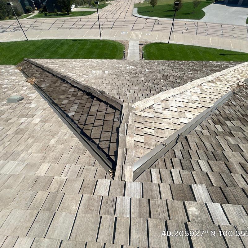 Wood shingle roof valley and ridge flashing inspection Wood shingle roof valley and ridge flashing inspection