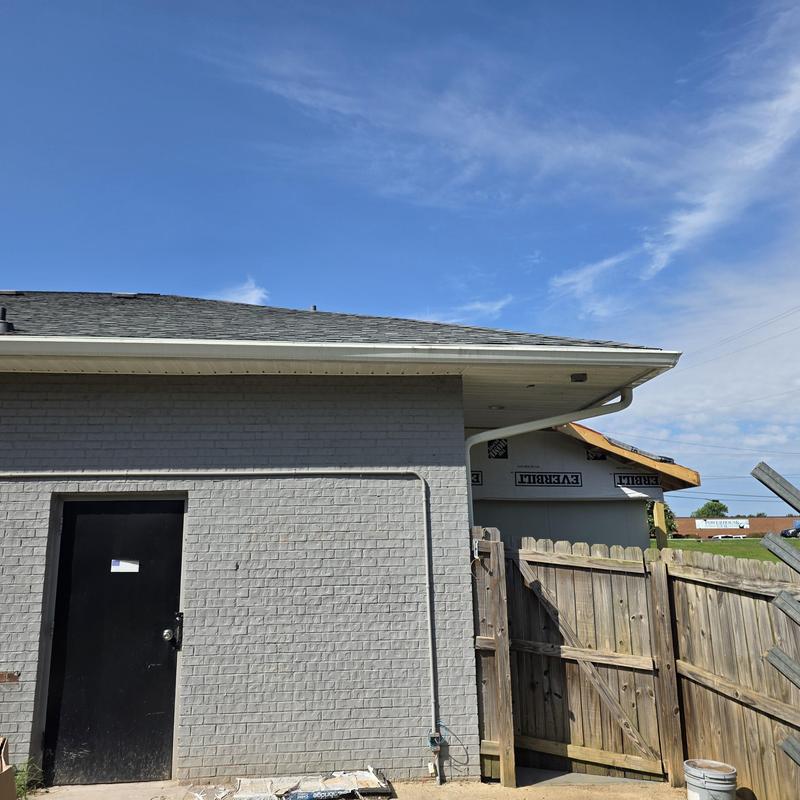 Charcoal gray IKO shingles with roof vent prep