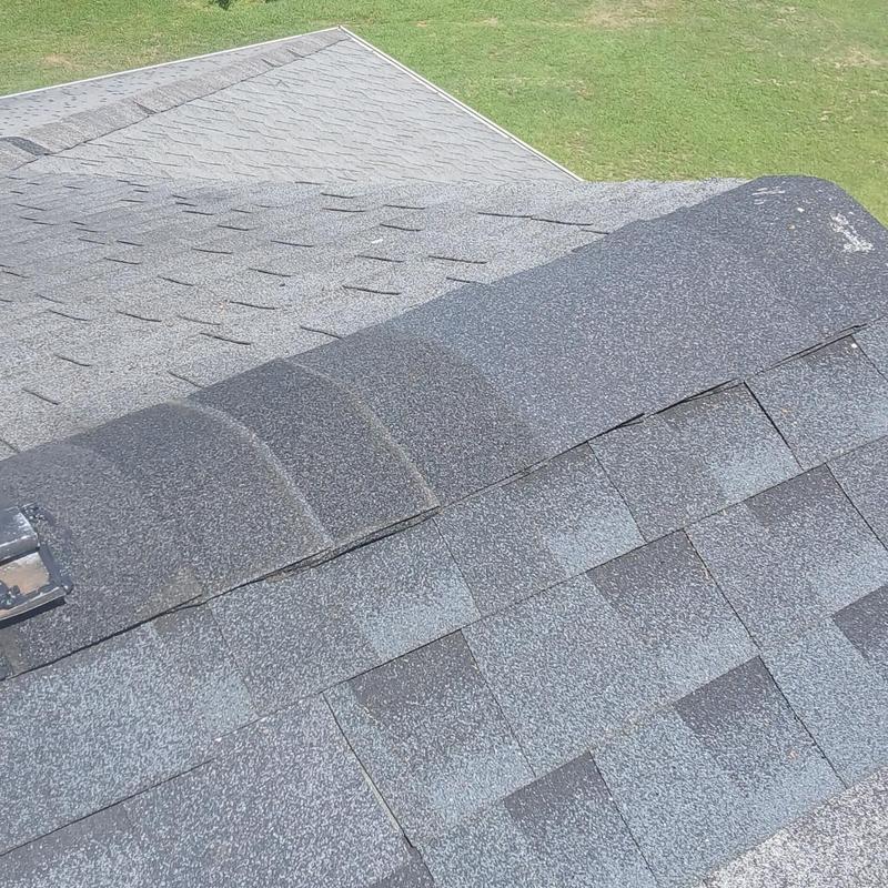 Ridge vent and asphalt shingle roof sections