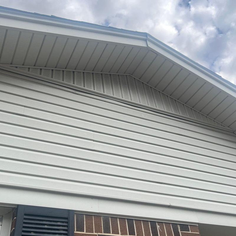 Vinyl siding and soffit on residential gable end